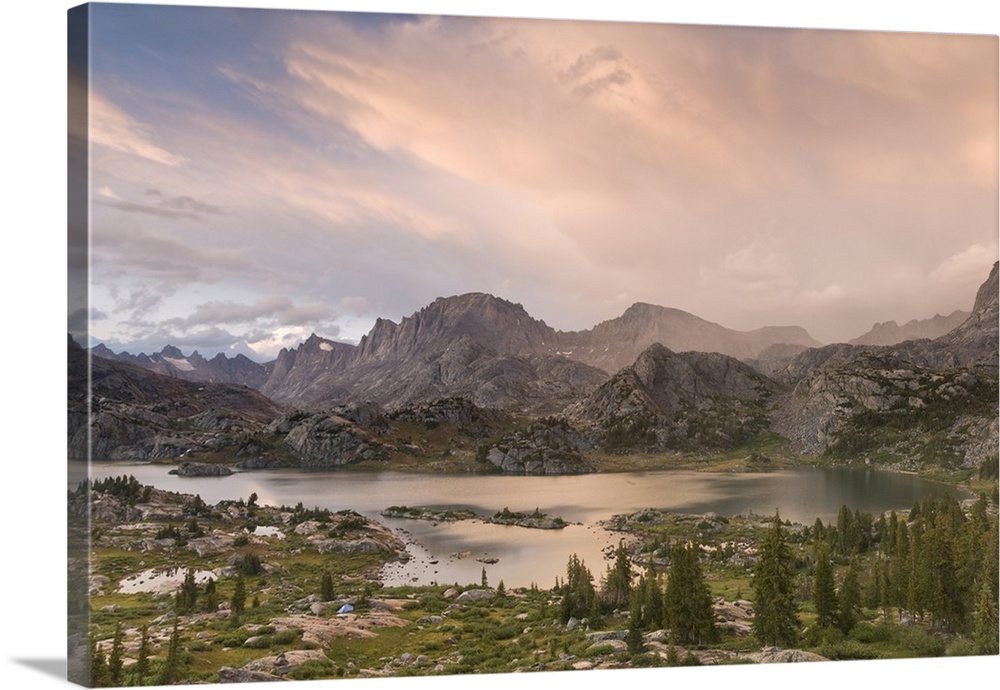 USA, Wyoming, Bridger National Forest, Bridger Wilderness. Sunset on Wind River Range and Island Lake with tent in foregro...