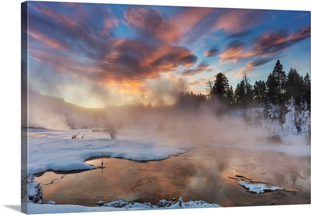 Brilliant sunrise clouds over Grassy Spring at Mammoth Hot Springs in Yellowstone National Park, Wyoming, USA