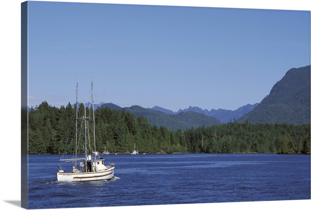 Canada, British Columbia, Vancouver Island.Fishing boat from Tofino harbor into Clayoquot Sound