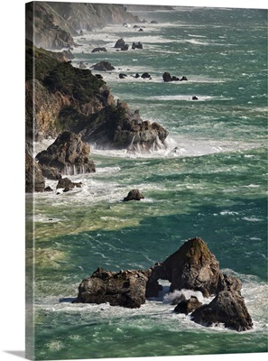 California, Big Sur. Waves hit coast and rocks