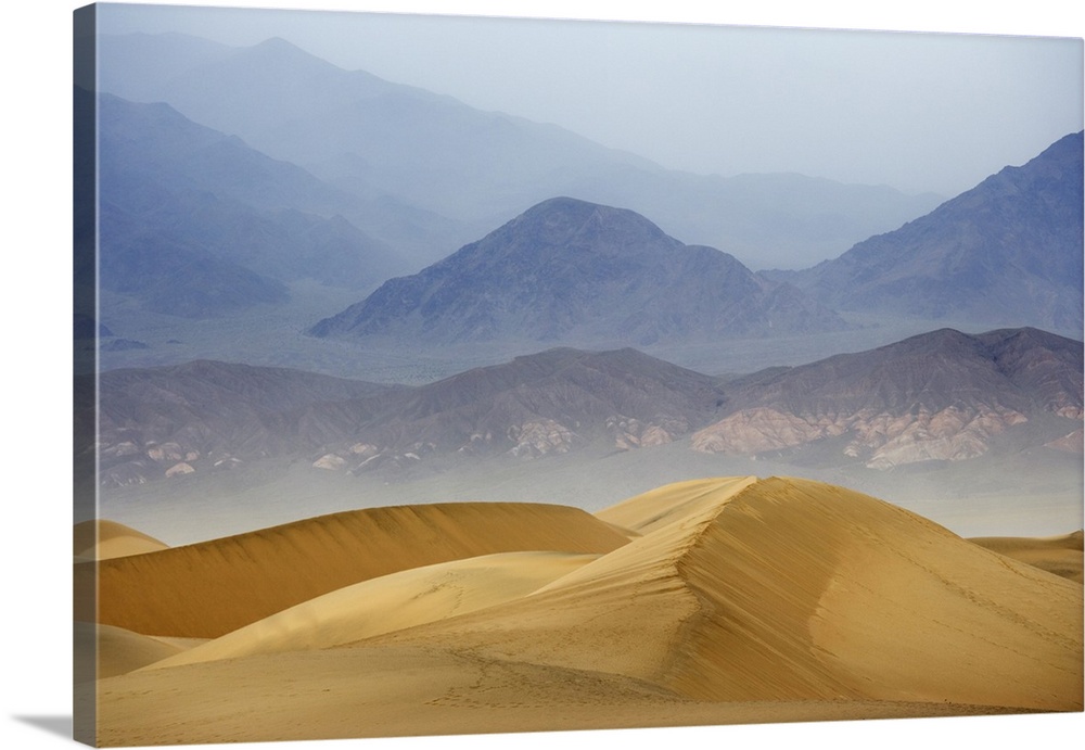 USA, California, Death Valley National Park. Sand dunes on stormy day. Credit: Dennis Flaherty / Jaynes Gallery