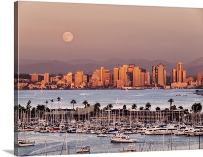 California, San Diego, Full moon rises over boats and city on San Diego Harbor