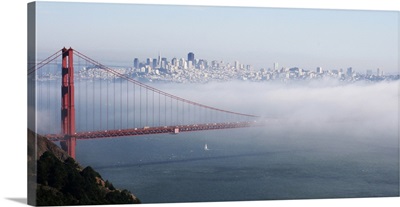 California, San Francisco Golden gate Bridge Disappearing into Fog