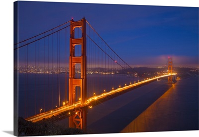 California, San Francisco. Golden Gate Bridge lit at night