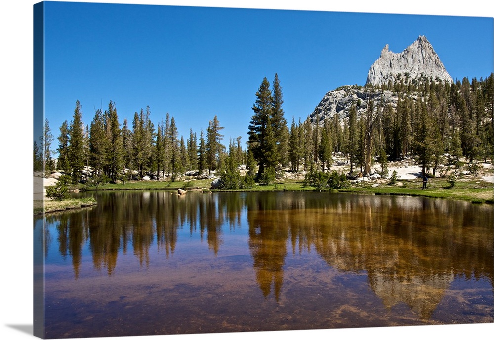 North America, USA, California, Yosemite National Park. Cathedral Peak reflected in a glacial tarn.