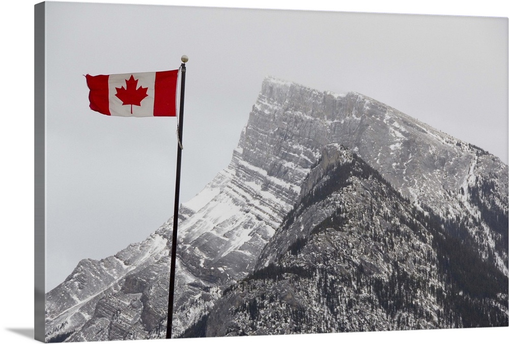 Canada, Alberta, Banff. Mountain view with flag.