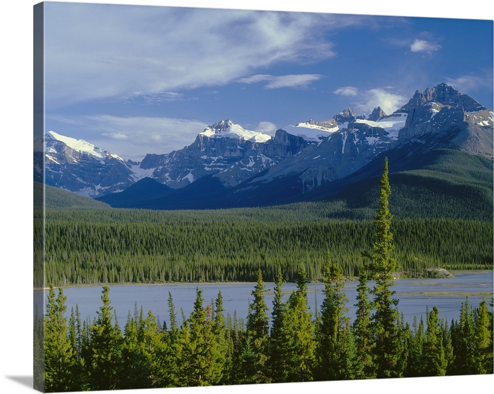 Canada, Alberta, Banff NP, Mount Sarbach and Kaufmann Peaks rise above North Saskatchewan River.