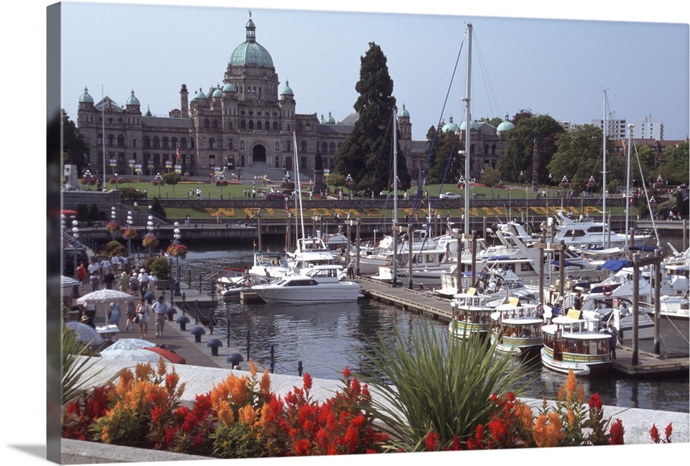 Canada, British Columbia, Victoria.Parliament Building, with ships and docks in foreground