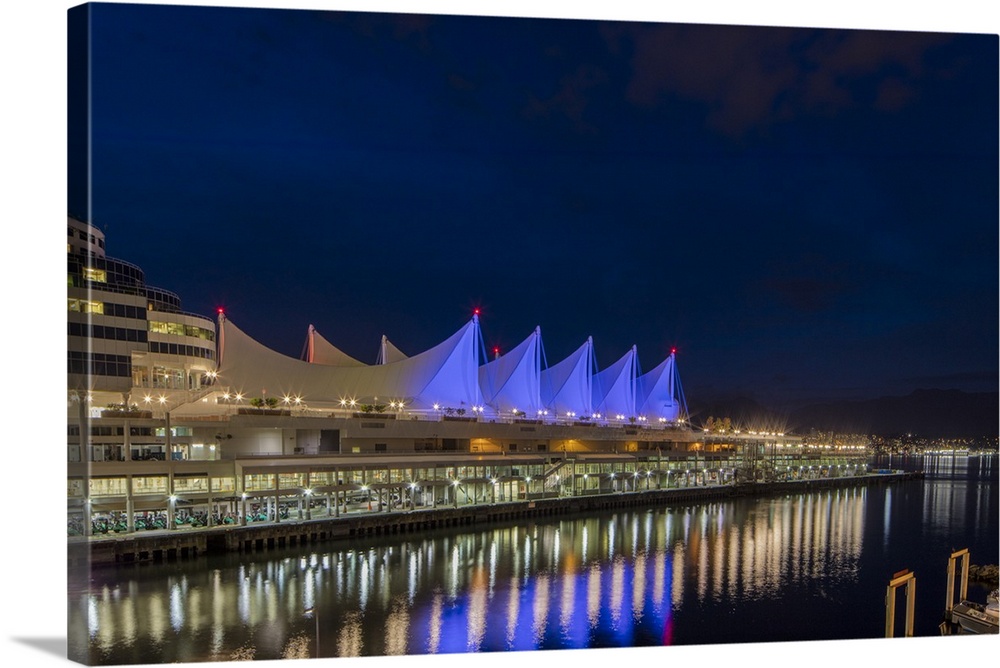 Canada Center lights reflect in harbor in Vancouver, Bitish Columbia, Canada