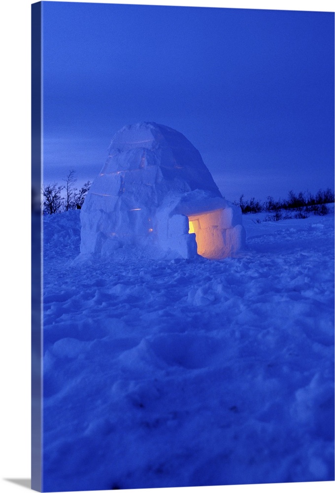NA, Canada, Manitoba, Churchill.Arctic igloo with candle light inside
