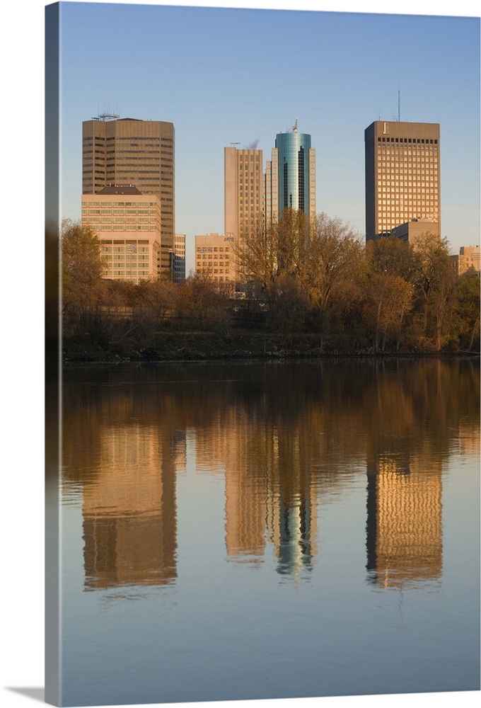 CANADA-Manitoba-Winnipeg:.Downtown Buildings reflected in the Red River / Dawn