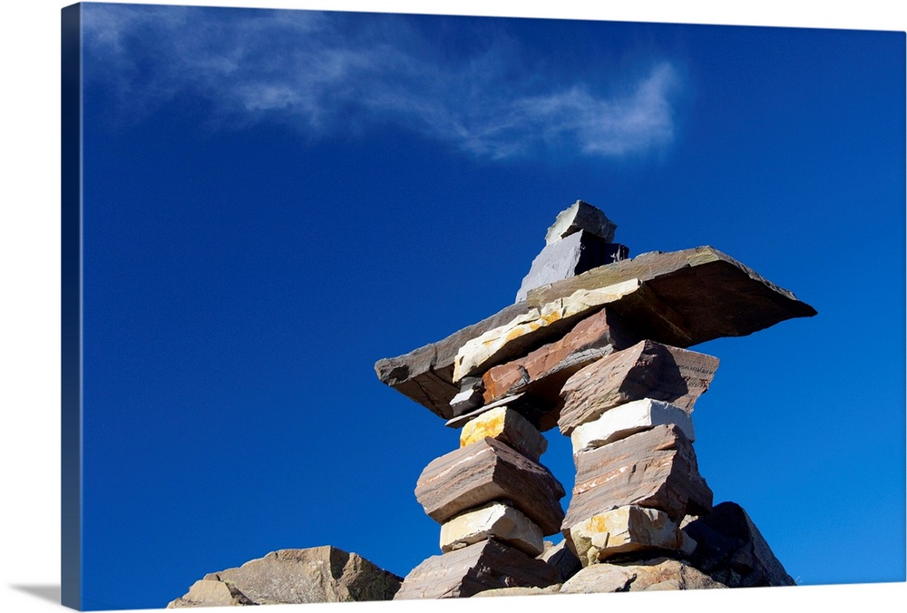 Canada, Newfoundland, St. John's. Inukshuk (to act the same way as a human). Traditional stone figure used by the Inuit to...