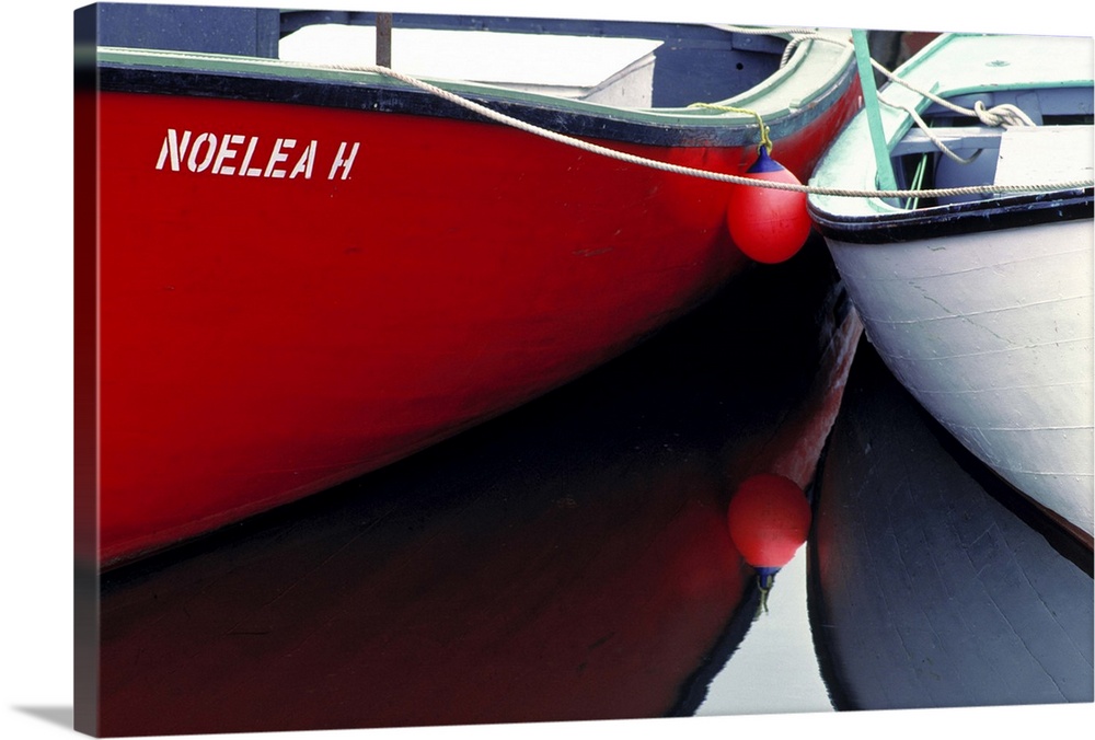 Canada, Nova Scotia, Canso. Two small boats are moored together at the Canso harbor in Nova Scotia, Canada.