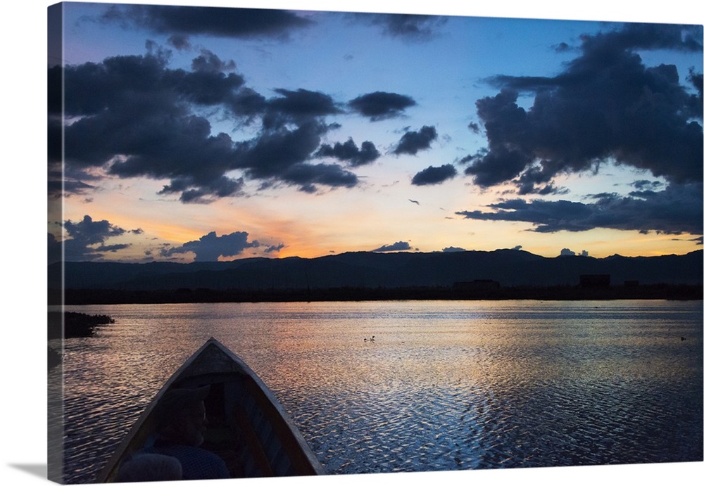 Canoe on Inle Lake at sunset, Shan State, Myanmar.