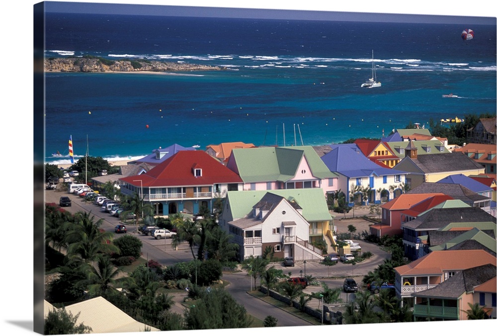 Caribbean, French West Indies, St. Martin.Orient Beach; Orient Bay Village; aerial view