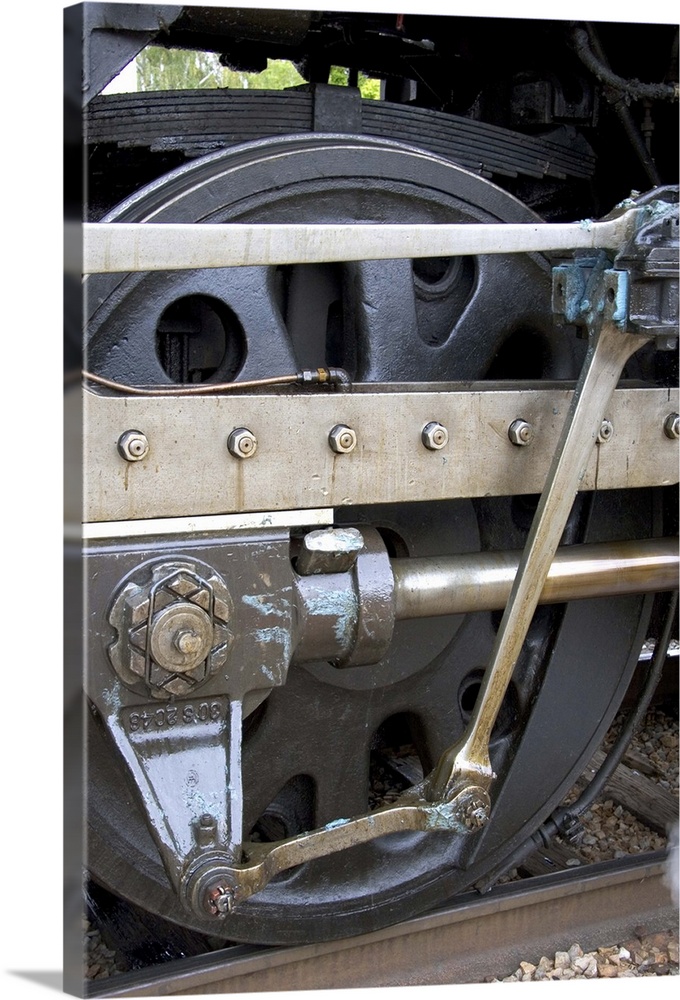 Close up detail view of steam locomotive drive wheel...train, rail, railroad, engine, engineer, locomotive, transportation...