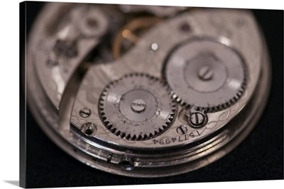 Close-up of internal moving parts of an antique watch