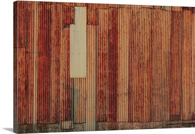 Close-up of rusted corrugated metal panels.