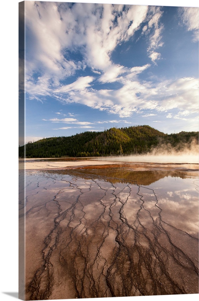 Cloud reflections over chemical Sediments. Yellowstone National Park. Wyoming.
