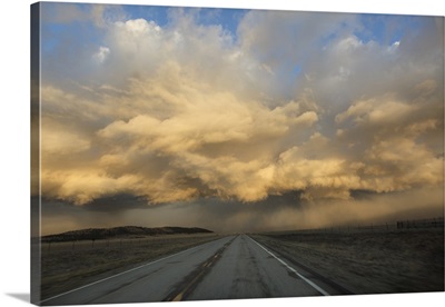 Colorado. Spring storm clouds at sunrise above South Park