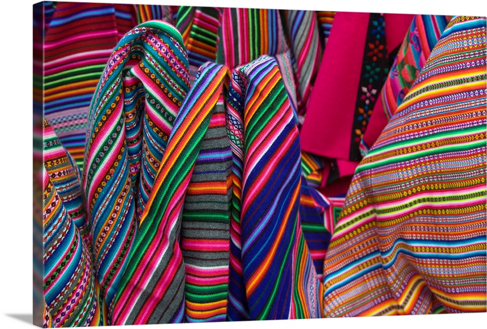 Colorful blankets on display at market, Huaraz, Peru, South America.