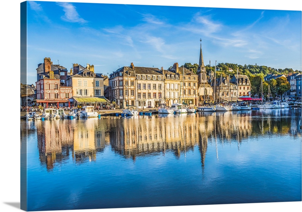 Colorful marina, Inner Harbor, Honfleur, France. Honfleur is famous for its reflections, which inspired Monet.