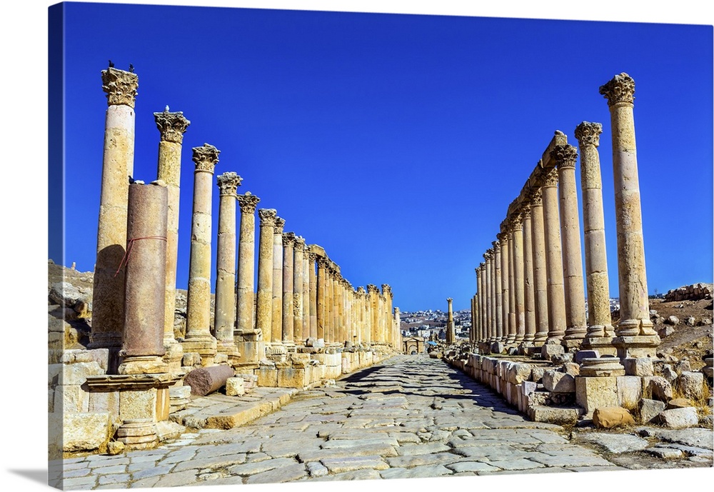 Corinthian Columns Ancient Roman Road City Jerash Jordan. Jerash came to power 300 BC to 100 AD and was a city through 600...