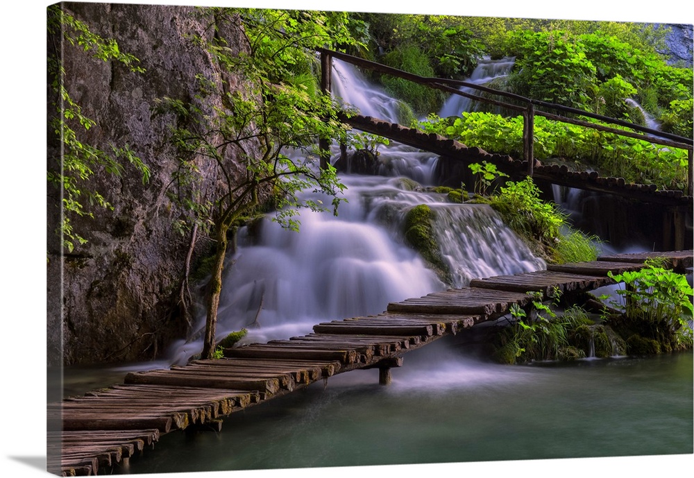 Croatia, Plitvice Lakes National Park. Scenic of waterfall and wooden walkway. Credit: Jim Nilsen / Jaynes Gallery