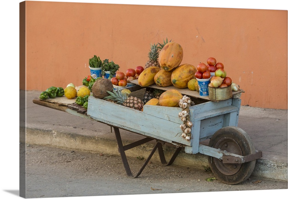 Cuba, Trinidad, wheelbarrow with fruit and vegetables.