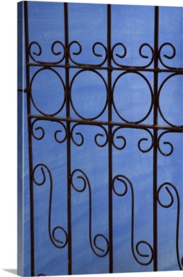 Cuba, Vinales, wrought iron gate and blue wall