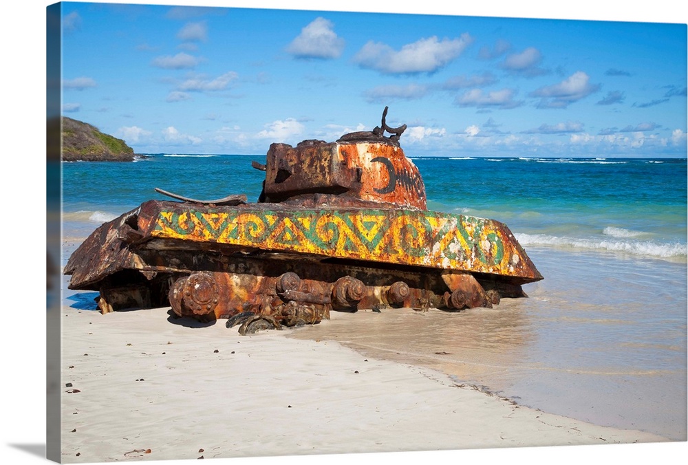 Culebra, Puerto Rico - An old abandoned military tank is sitting on the beach rusting. Horizontal shot.