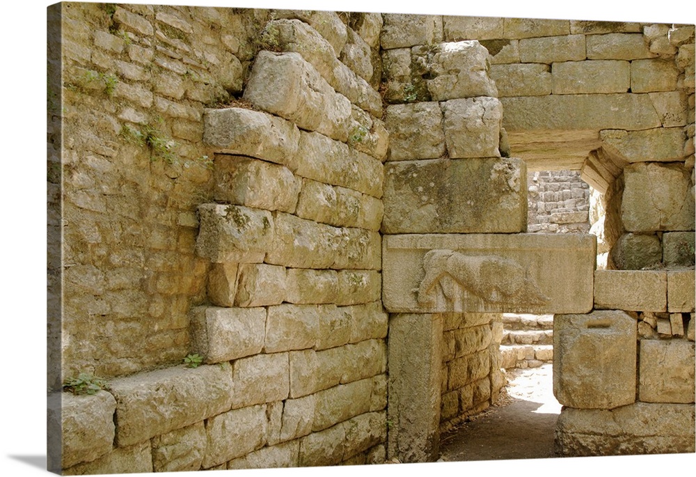 Cyclopean walls of the ancient city dating from IV century B.C. View of the gateway called Lion's Gate, one of the six ent...