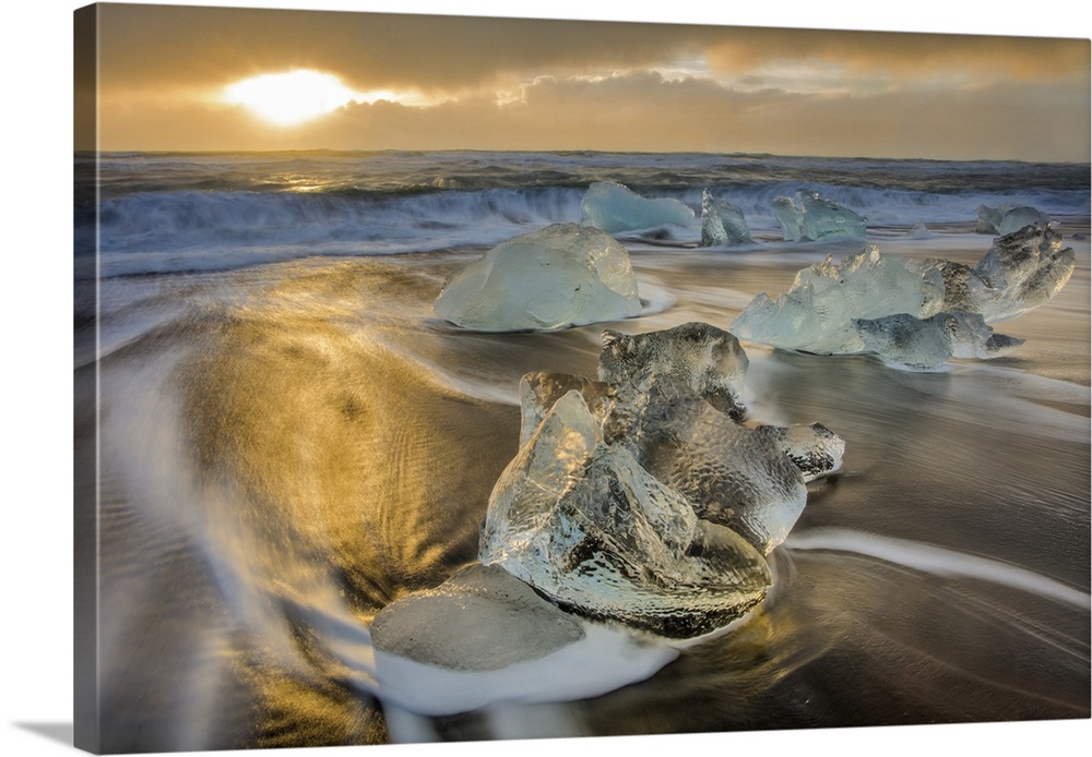 Diamond ice chards from calving icebergs on black sand beach at Jokulsarlon in south Iceland.