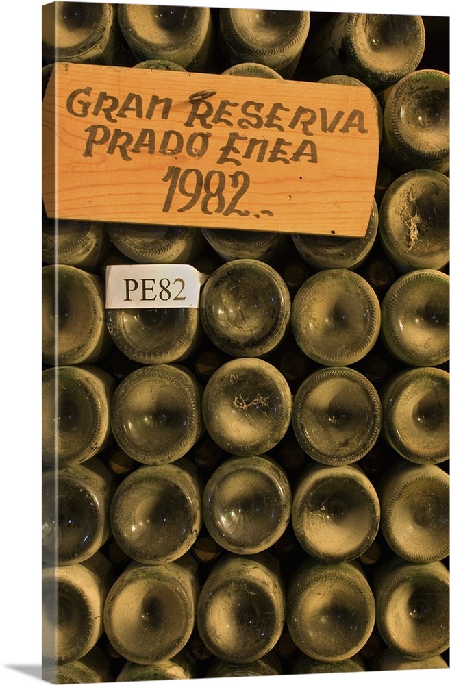 Dusty old bottles of gran reserva wine in Bodega Muga (Winery) in Haro village in La Rioja region of northern Spain.