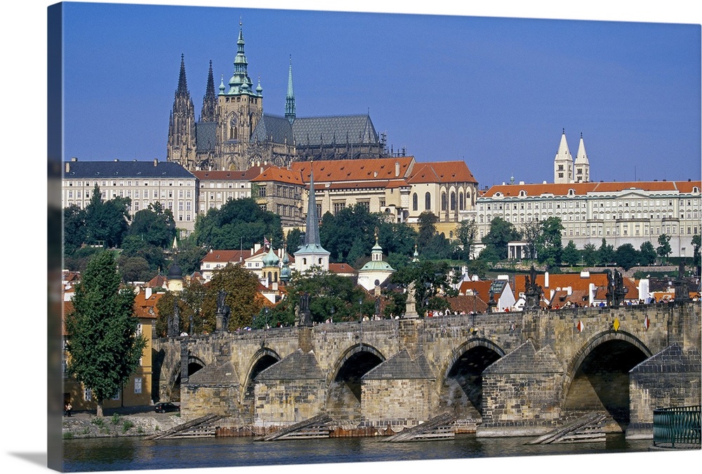 Eastern Europe, Czech Republic, Prague, St. Charles Bridge across the Vltava River with Prague Castle and St. Vitus Cathed...
