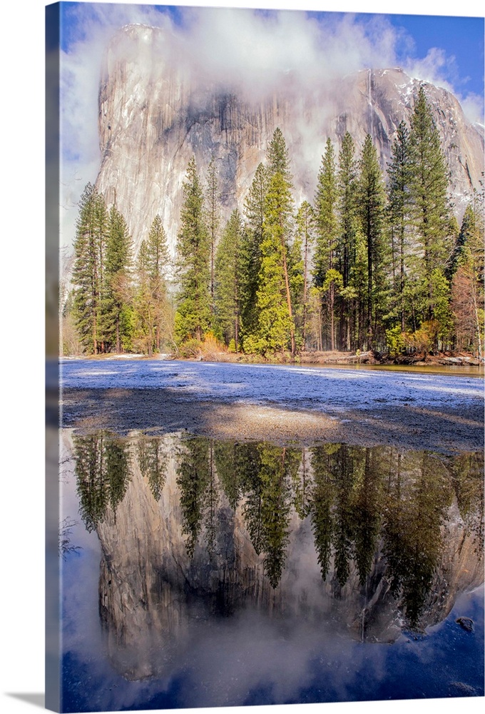 El Capitan seen from Cathedral Beach with reflection in Merced River. Yosemite National Park. California.