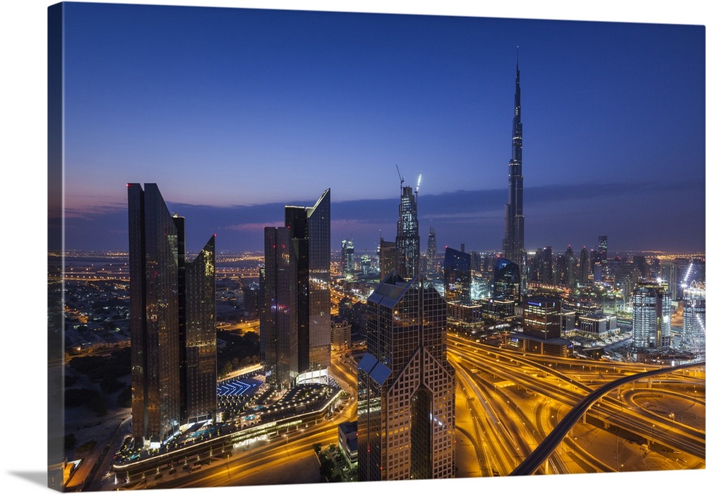 UAE, Dubai, Downtown Dubai, eleavted view over Sheikh Zayed Road and Burj Khalifa Tower, world's tallest building, 2016, dawn