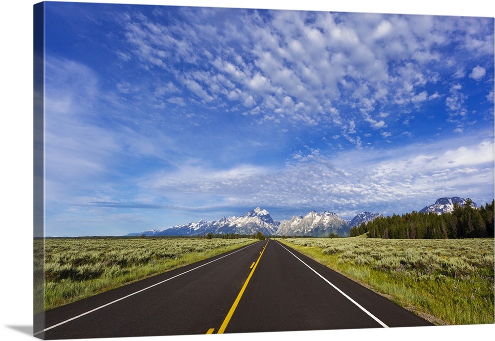 Empty park road in Grand Teton National Park, Wyoming, USA.