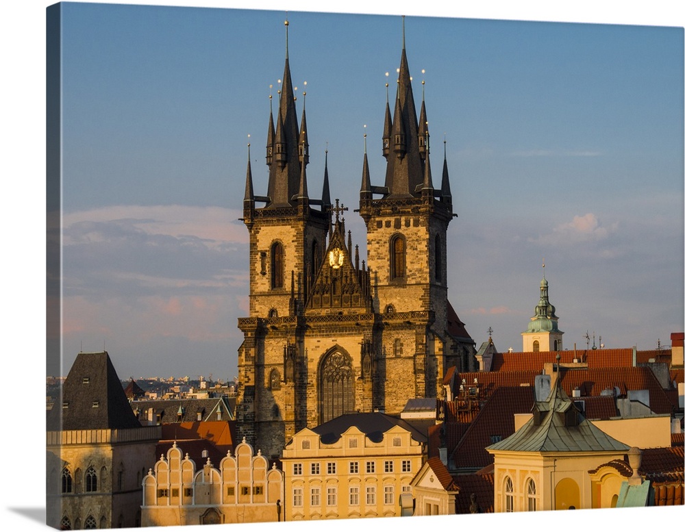 Europe, Czech Republic, Prague. Tyn Church, founded in 1385, dominates one side of the Old Town Square in Prague. The towe...