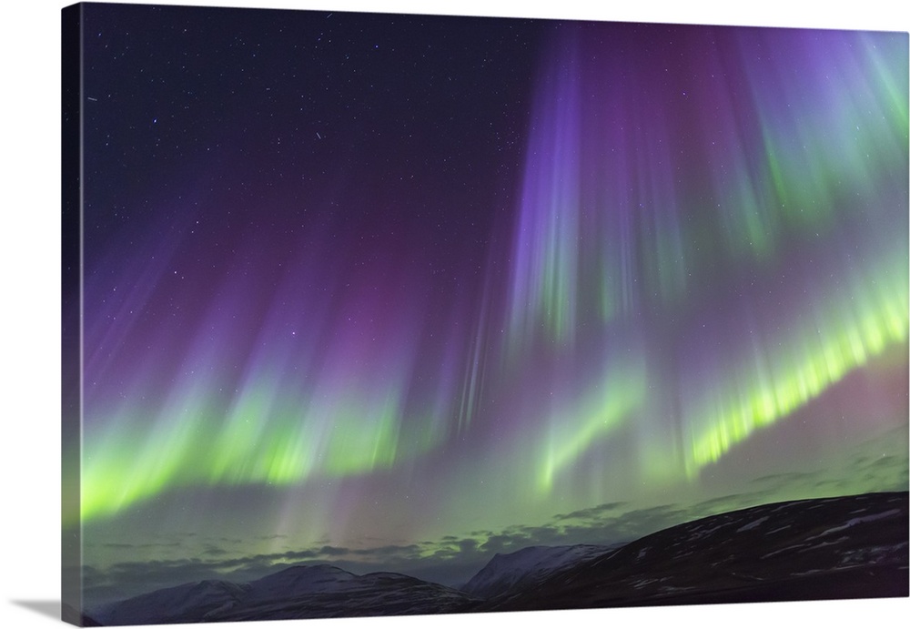Europe, Iceland, North Iceland, Near Akureyri. The northern lights glow in unbelievable colors.