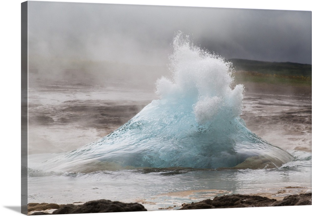 Europe, Iceland, Southwest, Golden Circle Strokkur Geyser. The Strokkur Geyser erupts with much steam.