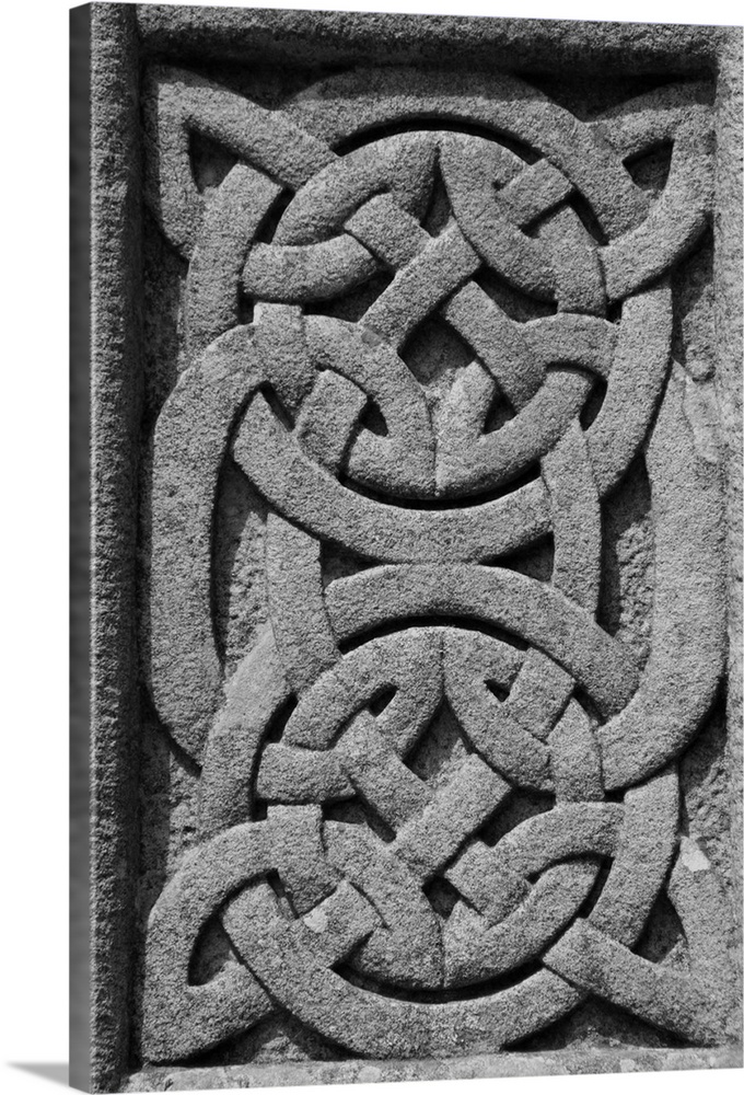 Europe, Ireland, Glendalough. Cletic Patterns on Cross at Glandalough.