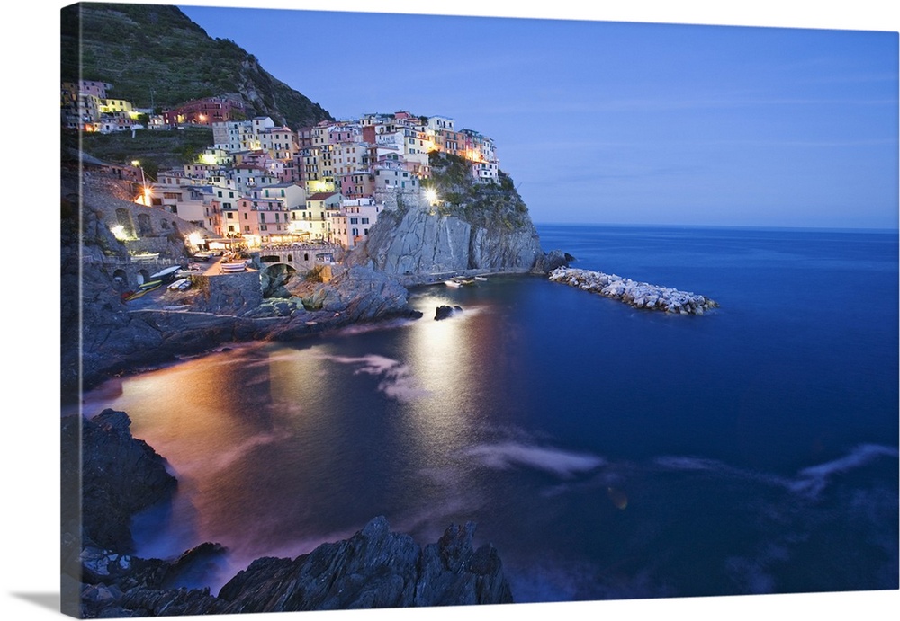 Europe, Italy, Manarola. Town and sea at sunset.