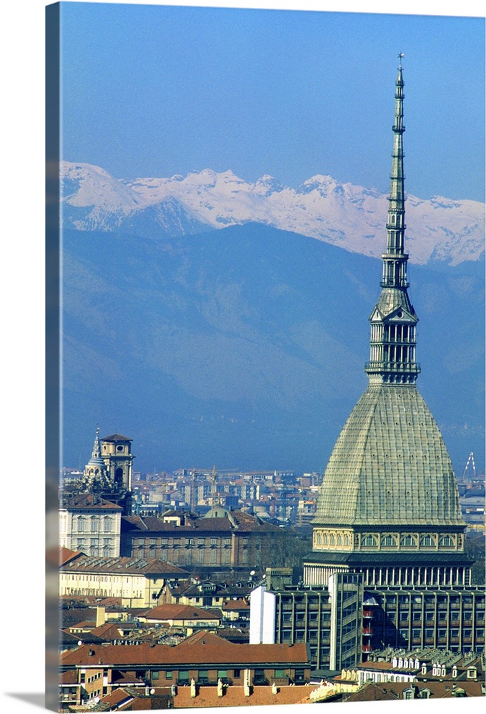 Europe, Italy, Turin.  The tower of the Mole with the snow capped peaks of the Dolomites.
