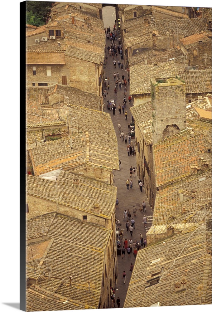 Europe, Italy, Tuscany, San Gimignano.View of Via San Giovanni from Palazzo del Popolo