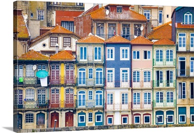 Europe, Portugal, Porto, Colorful Building Facades Next To Douro River