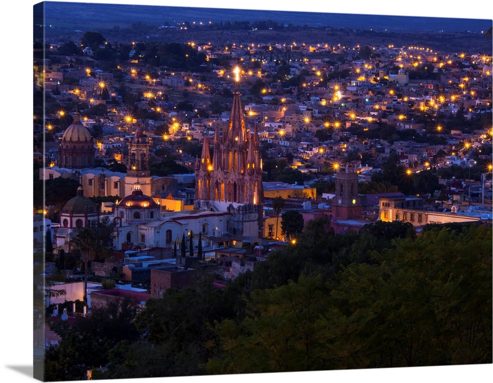 Evening City View from above City with Parroquia Archangel Church San Miguel de Allende.