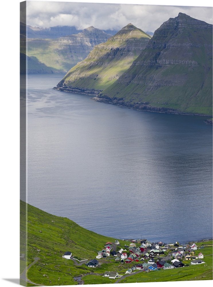 Village Funningur , in the background Funningsfjordur, Leiriksfjordur and the island Kalsoy. The island Eysturoy one of th...