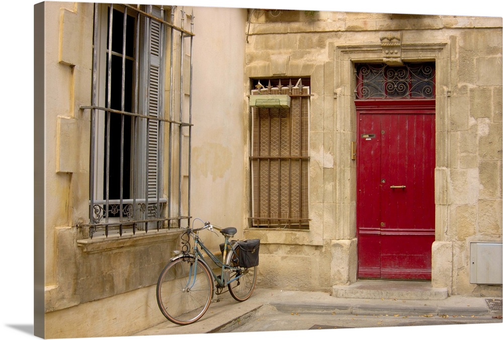 France, Arles, Provence, bicycle parked along building