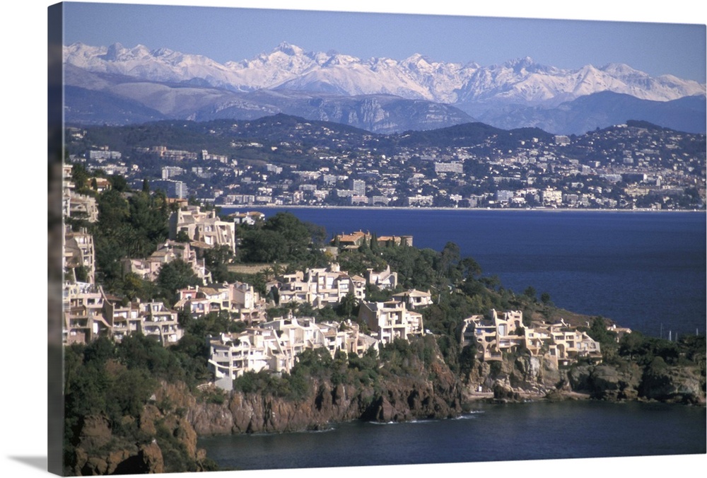 EU, France, Cote D'Azur, View of Cannes with Alpes Maritimes in background